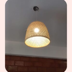 Soft woven rattan pendant light, modern ceiling lamp, warm ambient lighting fixture.