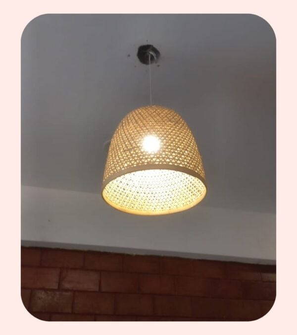 Soft woven rattan pendant light, modern ceiling lamp, warm ambient lighting fixture.