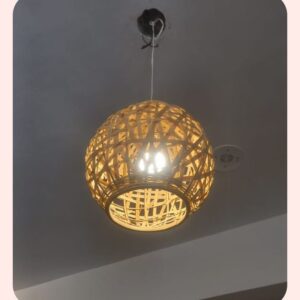 Warm woven rattan pendant light for modern interior decor.